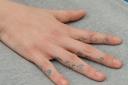 Distinctive: Webb's tattooed hand