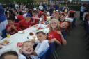 Royal salute: children tuck into a special tea