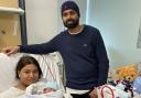Welcome to the world: Priya and Pripal with their new son on New Year's Day