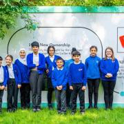 Making history: Pinkwell pupils beside the timeline at Hayes Village