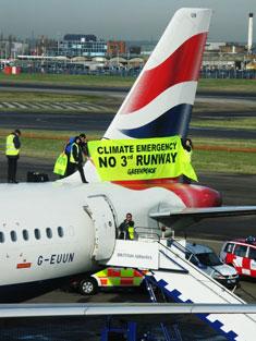 The protesters had climbed on top of the British Airways plane.