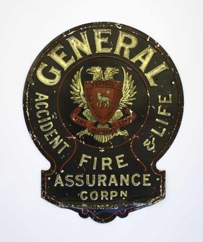 General Life & Fire Assurance Company fire-mark. In the centre is a two-headed eagle and a shield bearing a lamb and flag.
These lead or copper plaques embossed with the sign of the insurance company were intended as guides for fire fighters.