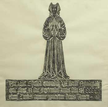 Framed brass rubbing of a memorial to Editha Neudegate, consisting of an image of Editha Neudegate and a Latin inscription, dated 1444, from Harefield parish church. 