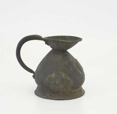 Victorian half pint measuring jug made of pewter. Pewter was used until the 19th Century in a series of affordable domestic objects, from simple plates to candle holders were all made of pewter, which was a long-lasting metal.
