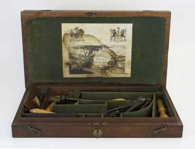 Ninteenth Century bullet making tool box containing tools and 12 bullets. A engraved plate on the lid reads H W Dyson. The inside lid reads: E & W Bond sword cutlers and gun makers to Her Majesty's Honorable Board of Ordnance.