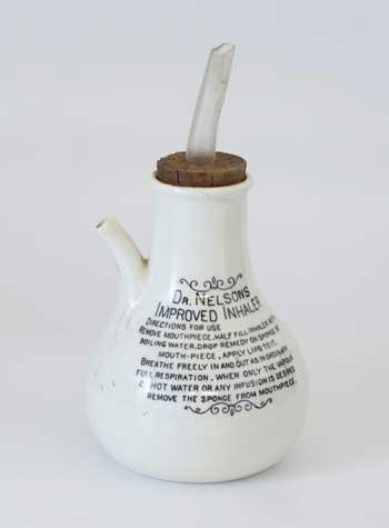 Victorian ceramic inhaler with original mouthpiece and cork stopper. Underglaze transfer printed on the front Dr. Nelson's Improved Inhaler. The inhaler would be half-filled with boiling water, the remedy dropped onto a sponge and the vapours inhaled.