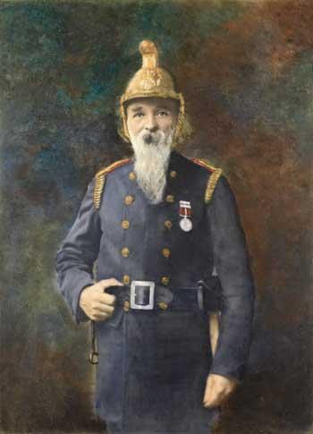 Framed portrait, over painted photograph, of David Roberts in fireman's uniform. David Roberts died aged 79 on January 8, 1926. For many years he was a member of the the Uxbridge Volunteer Fire Brigade.