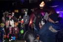 Ghoulies and ghosties: visitors queue for a Hallowe'en experience in Kempton Avenue