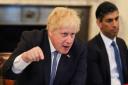 Boris Johnson faces crisis as two top ministers begin series of resignations