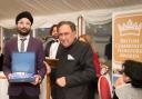 Honoured: Param Singh receives his award from Baron Sheikh