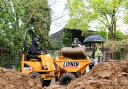 Earth movers: the Lynch dumper truck works on the wildlife island project
