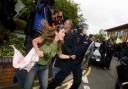 A protester is led away by police. PICTURE: Simon Jacobs.