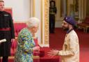 Honoured: Param Singh chats with the Queen