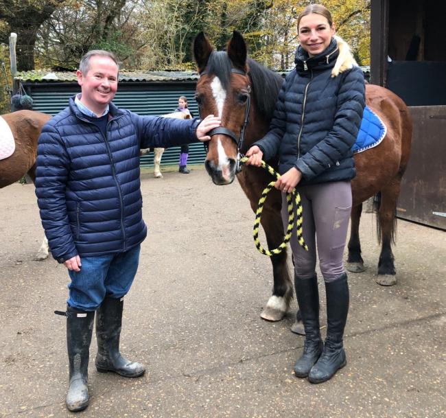 Saddle up! David Simmonds is suitably attired for his tour of Ruislip Park Stables