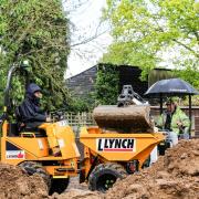 Earth movers: the Lynch dumper truck works on the wildlife island project