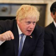 Boris Johnson faces crisis as two top ministers begin series of resignations