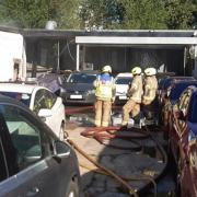 Mopping up: crews at the Delamere Road workshop