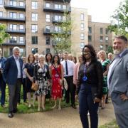 Hard work done: staff celebrate completion of the retirement sector at St Andrew's Park